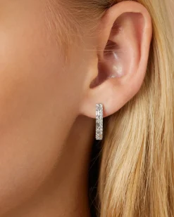Witgouden oorsieraden, 0.69 ct diamant, Gallery