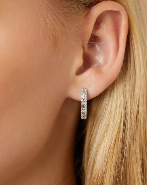 Witgouden oorsieraden, 0.69 ct diamant, Gallery